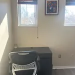 Warm Minimalist Bedroom + Free Parking