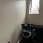 Warm Minimalist Bedroom + Free Parking